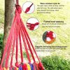 Relaxing in a portable hammock during outdoor camping