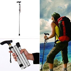 Folded walking stick placed in travel bag