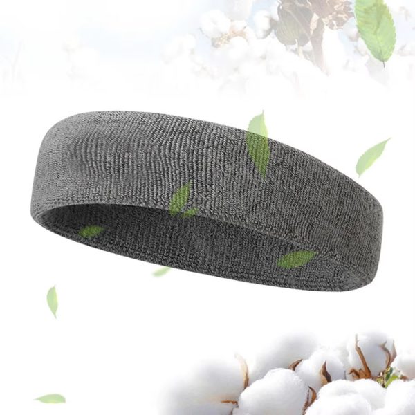 Running man with quick-dry fitness headband outdoors