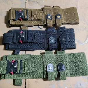 Belly elastic concealed carry holster with aluminum lock design for 9mm pistol, comfortable and adjustable waistband for secure firearm storage.